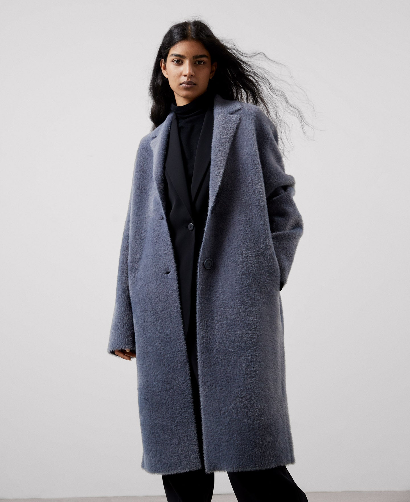 Grey coat store with belt