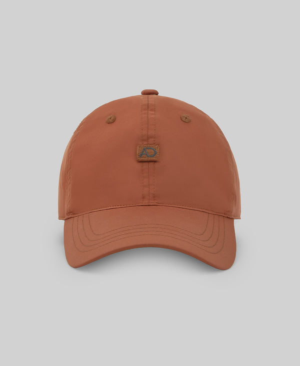 Technical fabric cap man in dark orange