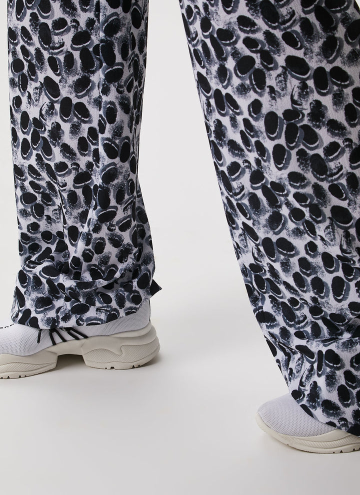 Women Trousers | Black And White Wide Trousers With Signature Print by Spanish designer Adolfo Dominguez