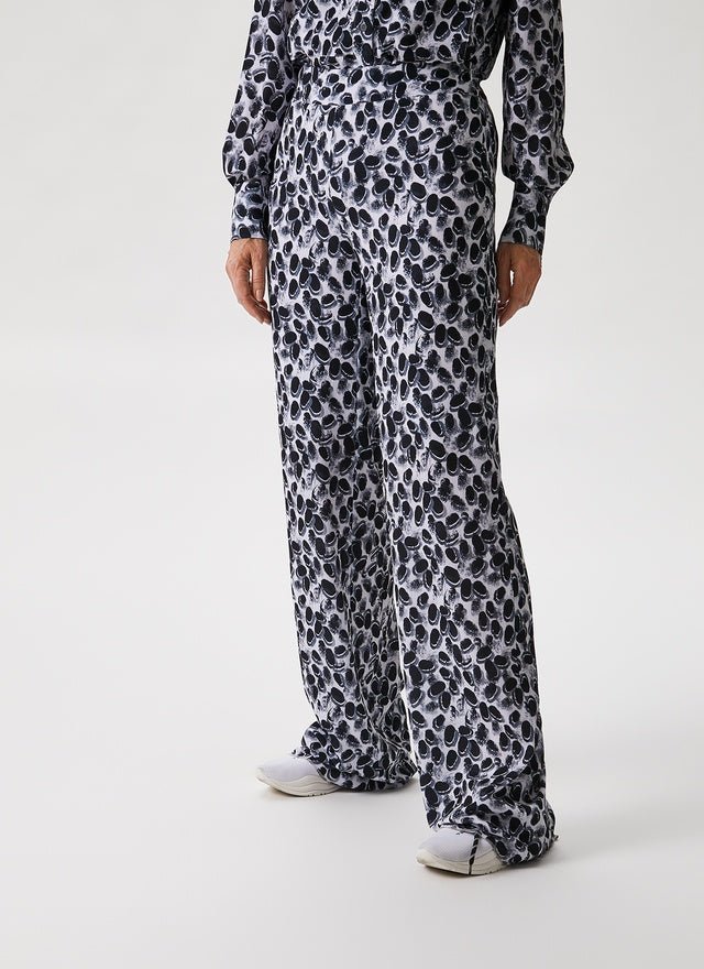 Women Trousers | Black And White Wide Trousers With Signature Print by Spanish designer Adolfo Dominguez