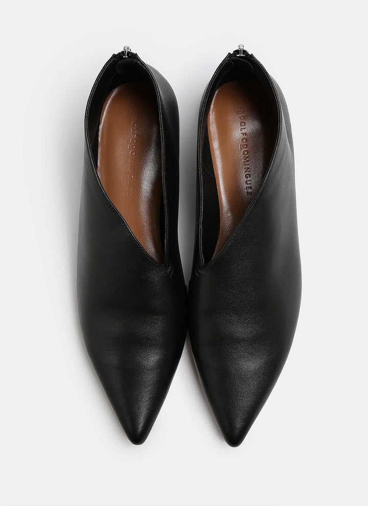 Women Shoes | Black Asymmetric Leather Slippers by Spanish designer Adolfo Dominguez