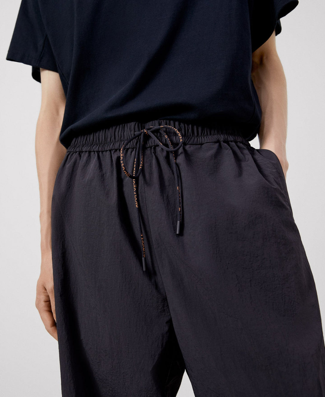 Men Trousers | Black Nylon Baggy Trousers by Spanish designer Adolfo Dominguez