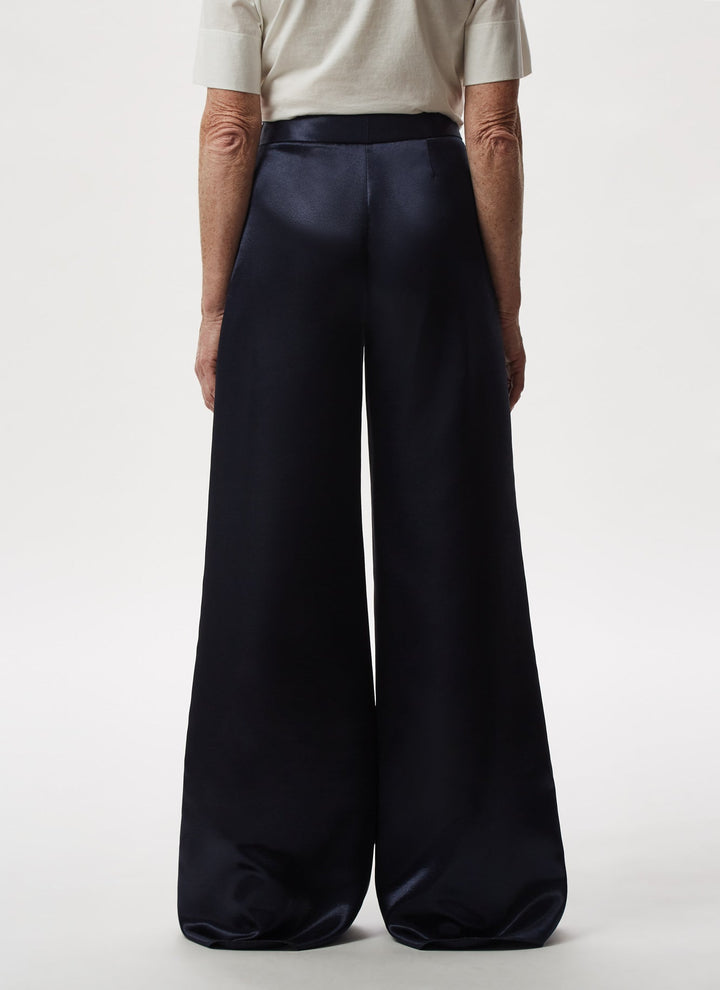 Women Trousers | Blue Fluid And Glossy Palazzo Trousers by Spanish designer Adolfo Dominguez