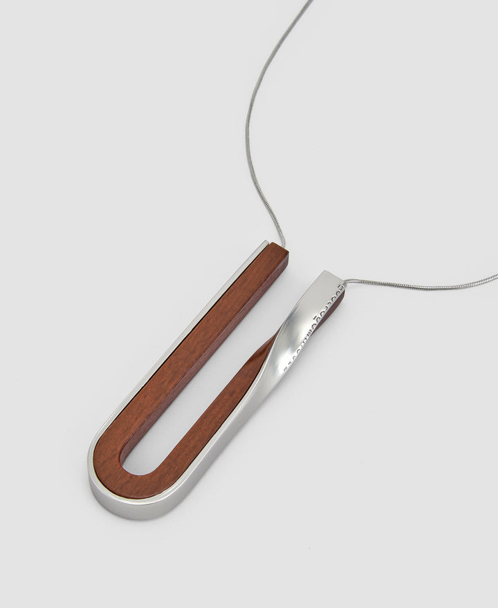 Women Necklace | Red Wood And Zinc Twist Pendant by Spanish designer Adolfo Dominguez