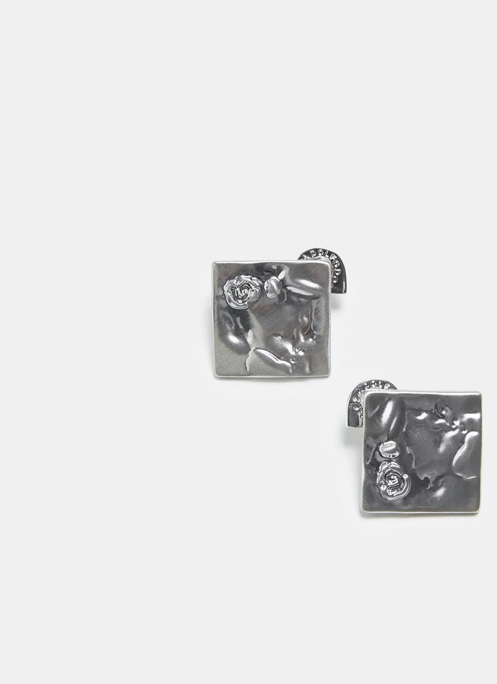 Women Earrings | Silver Short Earrings With Engraved Flower by Spanish designer Adolfo Dominguez